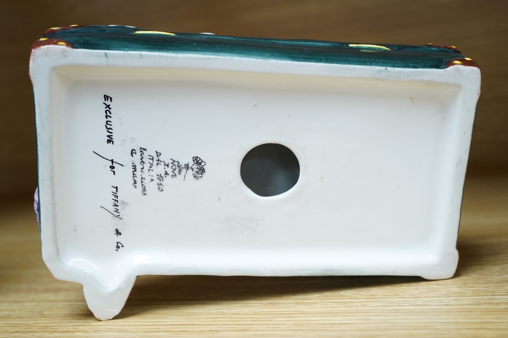 A Nove Italia ceramic sleeping dog, ‘exclusive for Tiffany & Co’ 19cm wide